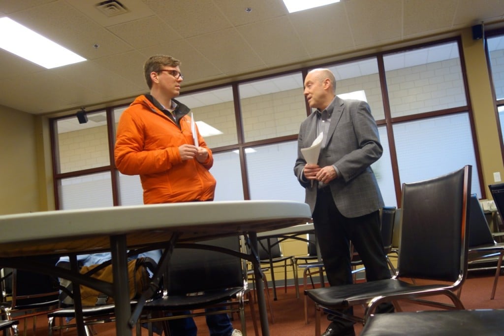 Destination BC director of partnership marketing Peter Harrison (right) chats with a participant at today's workshop.