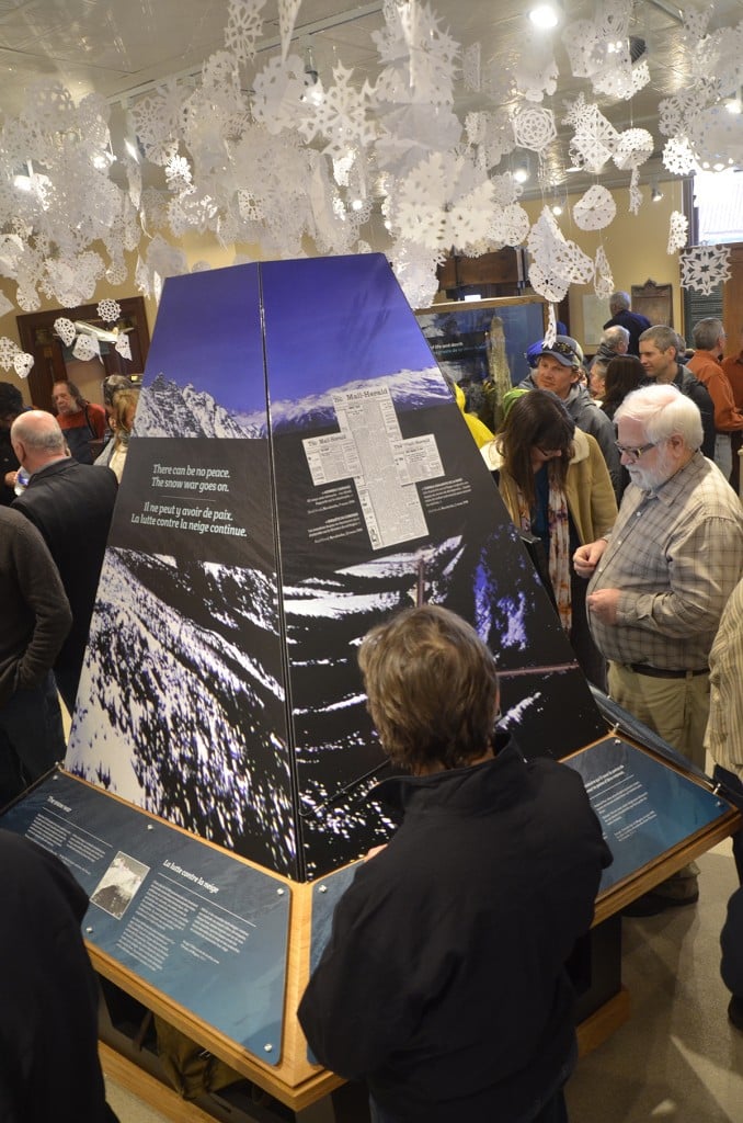 Visitors check out new Land of Thundering Snow kiosks at the Revelstoke Museum & Archives on Mar. 4. Photo: Aaron Orlando/Revelstoke Mountaineer