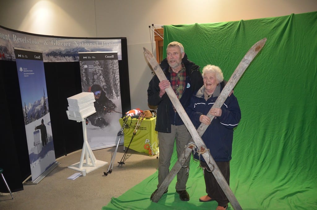 Bill and Helen Shuttleworth pose for a green screen shot at the Parks Canada display. Photo: Aaron Orlando/Revelstoke Mountaineer