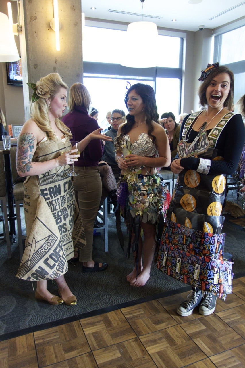 Models chat after the catwalk feature at the Trashion event. Photo: Jake Philpott
