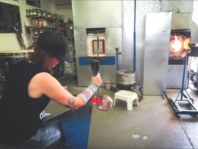Leah Allison works on her glass in the workshop in Invermere. Photo: Leah Allison
