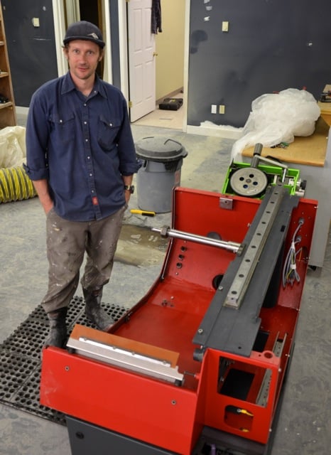 The Wax Bench store owner Dougal Pow with his specialized equipment. Photo: Emily Kemp/Revelstoke Mountaineer