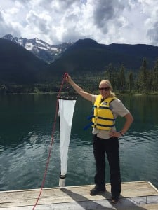 Laura Gaster, the CSISS Aquatic Invasive Species Program Coordinator, samples for invasive mussel larva (veliger) in Trout Lake as part of the early detection program to protect our waters. To date, no invasive mussels have been detected in the Columbia Shuswap.