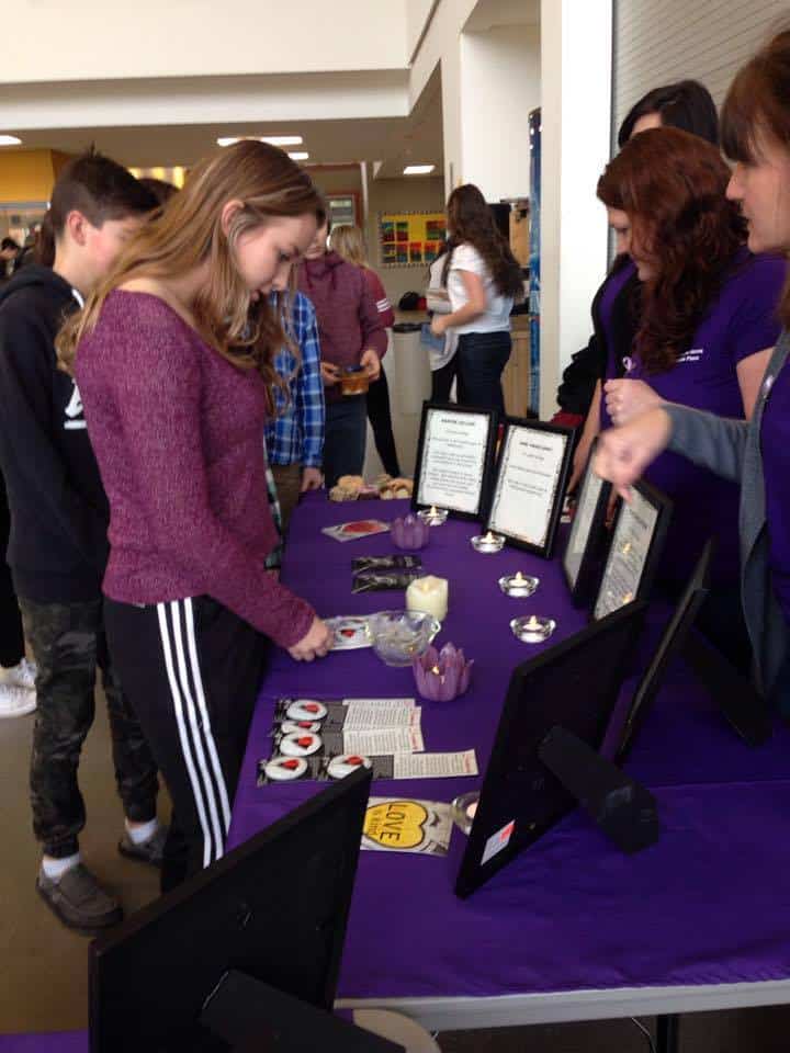 Students at Revelstoke Secondary School visit the Revelstoke Women's Shelter information booth. Photo: Emily Kemp/Revelstoke Mountaineer