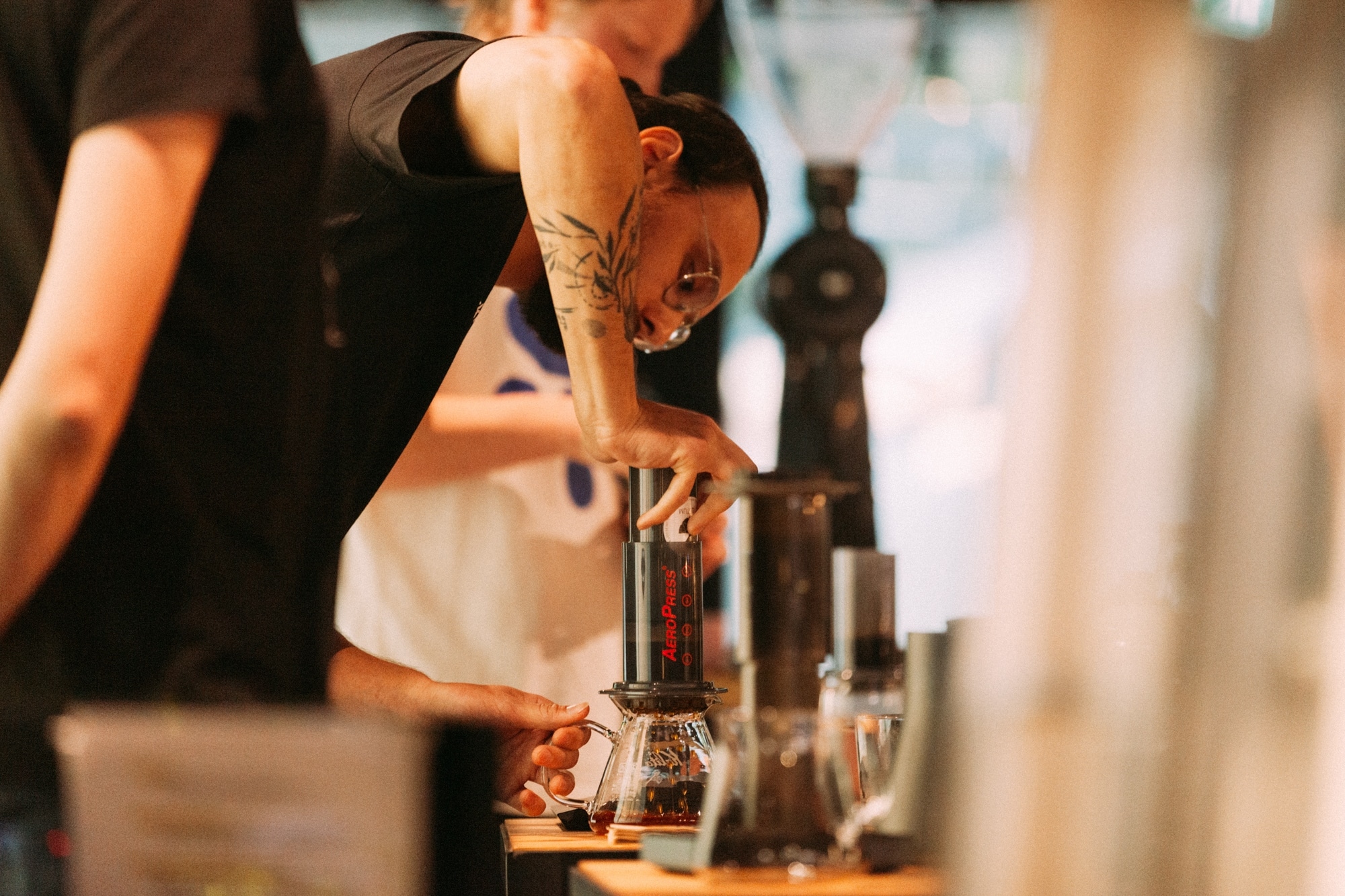 The Canadian AeroPress Championship Revelstoke regional qualifier side shot of someone pressing down an AeroPress